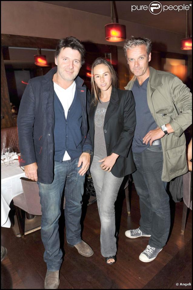 Vanessa Demouy et son mari Philippe Lellouche avec David Brécourt chez Castel, le 16 septembre 2009, lors de la soirée de la maison Mumm