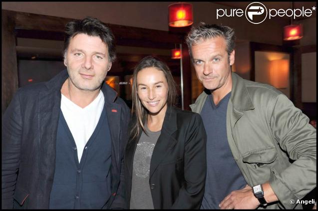 Vanessa Demouy et son mari Philippe Lellouche avec David Brécourt chez Castel, le 16 septembre 2009, lors de la soirée de la maison Mumm