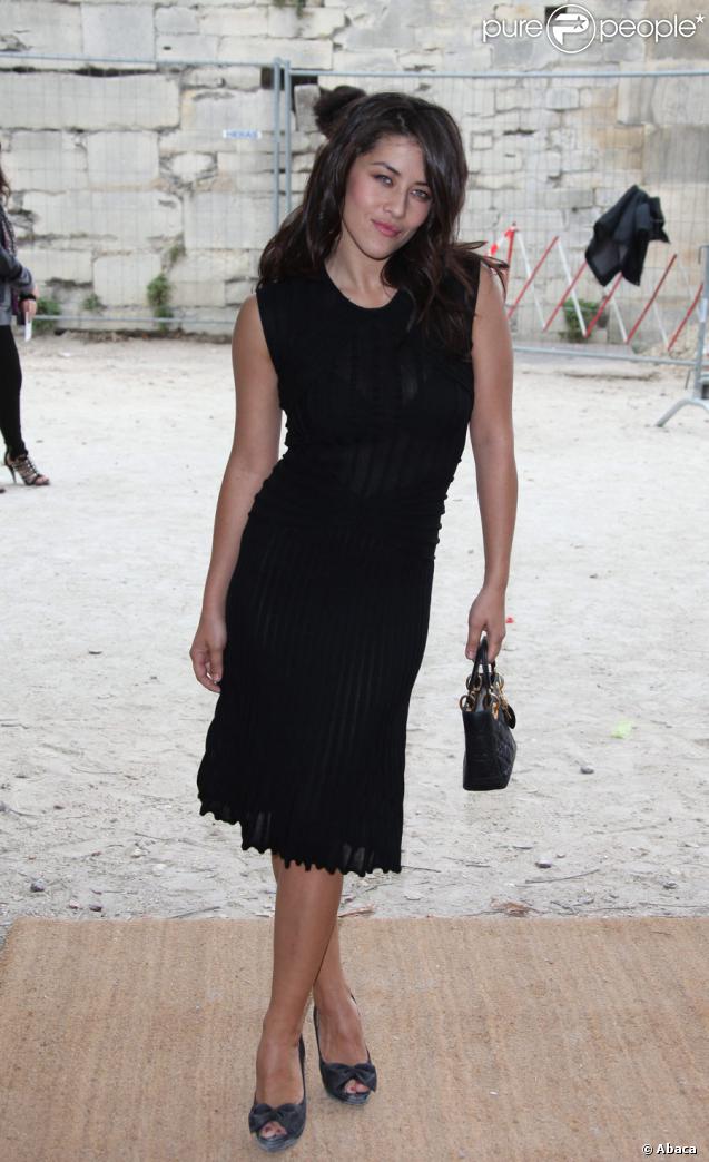 Mylène Jampanoï au défilé Christian Dior, collection prêt-à-porter printemps-été 2010, au Jardin des Tuileries, le 2/10/09.