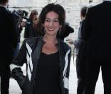 Béatrice Ardisson au défilé Christian Dior, collection prêt-à-porter printemps-été 2010, au Jardin des Tuileries, le 2/10/09.