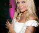 Pamela Anderson : presque élégante... pour promouvoir son parfum ! On a dit...Presque !