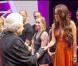 Découvrez Miley Cyrus, Lady Gaga, Whoopi Goldberg, Bette Midler aux côtés de... la reine Elizabeth II !