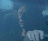 Roman Polanski dans sa limousine à son arrivée à Gstaad le 4 décembre 2009