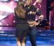 Mike Tyson et sa partenaire Elena effectuent une danse endiablée sur le plateau de Ballando con le stelle. Janvier 2010
