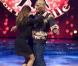 Mike Tyson et sa partenaire Elena effectuent une danse endiablée sur le plateau de Ballando con le stelle. Janvier 2010