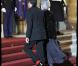François Fillon, ses chaussettes rouges, et son épouse arrivent à l'Elysée pour un luxueux dîner d'Etat. 2/03/2010