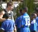 Mickaël coache ses petits joueurs de foot  