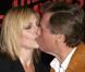 Ryan O'Neal au bras de sa fille Tatum O'Neal, à l'occasion de l'avant-première de  The Runaways , qui s'est tenue à l'ArcLight Theatre du Cinerama Dome de Los Angeles, le 11 mars 2010.