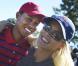 Le grand Tiger Woods dans les bras de sa femme Erin Nordegren. 
