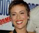 La ravissante Alyssa Milano, un rayon de soleil lumineux sur tapis rouge...