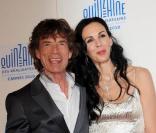 Mick Jagger et sa compagne L'Wren Scott assistent à la projection du documentaire  Stones in Exile , à Cannes, dans le cadre de la Quinzaine des Réalisateurs, mercredi 19 mai 2010.