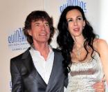 Mick Jagger et sa compagne L'Wren Scott assistent à la projection du documentaire  Stones in Exile , à Cannes, dans le cadre de la Quinzaine des Réalisateurs, mercredi 19 mai 2010.