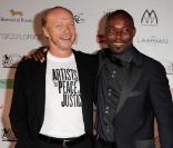 Cannes - Soirée Artsits for Peace and Justice, au VIP Room Palm Beach,  le 20 mai 2010 : Paul Haggis et Jimmy Jean Louis. 