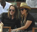 Hélène Ségara et Mathieu Lecat, son époux, au tournoi de Roland-Garros. 2/06/2010
