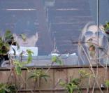 John Travolta et son épouse Kelly Preston ont un déjeuner de travail avec inconnu à l'Hôtel Fasano à Rio de Janeiro le 16 juin 2010 