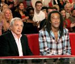 Yannick Noah et Michel Sardou en 2004