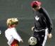 David Beckham et son fils Romeo viennent soutenir le petit Cruz, 5 ans, qui joue un match de foot à Santa Monica, samedi 9 octobre.