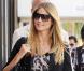 Heidi Klum totalement "in" avec son slim, son top léopard, son blazer et ses sandales YSL.