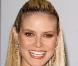 Heidi klum, une beauté souriante qui réussit toujours à nous séduire !