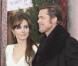Angelina Jolie, habillée en Atelier Versace et au côté de Brad Pitt, lors de l'avant-première de The Tourist à New York le 6 décembre 2010