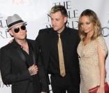 Nicole Richie avec Joel et Benji Madden en octobre 2009 à Los Angeles 