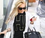 Lindsay Lohan se rend à la salle de gym avec le Birkin d'Hermès, version noire.