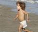Matthew McConauguey avec Vida et Levi, sur une plage de Los Angeles. 23 janvier 2011