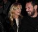 Kate Moss et Stefano Pilati lors du défilé Etam, au Grand Palais, le 24 janvier 2011