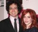 La ravissante Christina Hendricks et son compagnon Geoffrey Arend lors de la rencontre avec les fans de la série  Mad Men , au Forum des Images, à Paris, le 9 février 2011.
