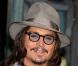 Johnny Depp et Isla Fisher, avant-première de  Rango  à Los Angeles, le 14 février 2011