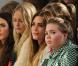 Poppy Delevigne, Yasmin Le Bon et sa fille Saffron Le Bon au défilé Matthew Williamson à la Fashion Week de Londres, le 20 février 2011.