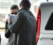 Miranda Kerr et Orlando Bloom à l'aéroport Roissy-Charles de Gaulle, à Paris, retournent à Los Angeles. 5 mars 2011