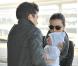Miranda Kerr et Orlando Bloom à l'aéroport Roissy-Charles de Gaulle, à Paris, retournent à Los Angeles. 5 mars 2011