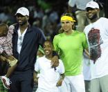 Lebron James en présence de Rafael Nadal et Dwayne Wade à Miami lors du dernier Master 1000 à Miami le 27 mars 2011. Il est désormais actionnaire mioritaire du club de Liverpool. Le basketteur star déborde toujours autant d'ambition