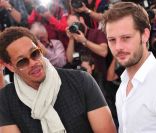 JoeyStarr et Nicolas Duvauchelle à l'occasion du photocall de  Polisse , présenté aujourd'hui au 64e Festival de Cannes, le 13 mai 2011.