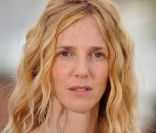 Sandrine Kiberlain à l'occasion du photocall de  Polisse , présenté aujourd'hui au 64e Festival de Cannes, le 13 mai 2011.