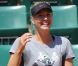 Maria Sharapova, 24 ans, a bien des raisons d'être radieuse : numéro 7 mondial, elle aborde Roland-Garros dans les meilleures conditions ! Victorieuse à Rome, elle peut compter sur le soutien de son fiancé Sasha Vujacic, comme lors de son entraînement Porte d'Auteuil, le 18 mai 2011.