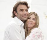 Patrick Puydebat et Hélène Rollès bras dessus bras dessous  sur le tapis rouge lors du 51ème festival de la télévision de Monte-Carlo, jeudi 9 juin 2011.