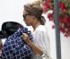 Nicole Richie avec une amie dans les rues de Los Feliz près de Los Angeles en juin 2011 et dans un look au top 