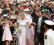 Charlène Wittstock fait son entrée dans la Cour d'honneur du palais  princier, pour la cérémonie religieuse l'unissant au prince Albert, à  Monaco, le 2 juillet 2011