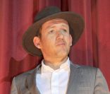 Dany Boon, chapeauté, présente Rien à déclarer à Munich en Allemagne le 6 juillet 2011 