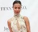 Zoe Saldana au match de polo de charité organisé au  Santa Barbara Polo and Racquet club pour l'association des princes William et Harry. Carpinteria, 9 juillet 2011  