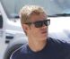 Les acteurs de la série 90210 en plein tournage sur la plage de la saison 4 du remake de Beverly Hills, à Los Angeles, le 17 août 2011. Ici Trevor Donovan 