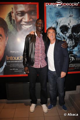 Omar Sy et François Cluzet lors de l'avant-première du film Intouchables au festival du film francophone d'Angoulême le 24 août 2011