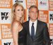 Stacy Keibler avec George Clooney, posant pour la première fois ensemble lors du festival du film de New York le 17 octobre 2011 