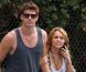 Liam Hemsworth et Miley Cyrus, à Los Angeles, le 7 août 2011.