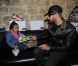 Swizz Beatz et sa fille Nicole à la boutique Auguste à Bastille pour la présentation et la dédicace de la chaussure que le producteur a dessinée pour la marque Reebok. Le 17 novembre 2011