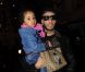 Swizz Beatz et sa fille Nicole ( en Gucci de la tête aux pieds) à la boutique Auguste à Paris (Bastille) pour la présentation et la dédicace de la chaussure que le producteur a dessinée pour la marque Reebok. Le 17 novembre 2011