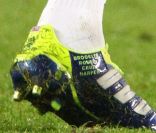 Les chaussures Predator de David Beckham, fabriquées par son équipementier Adidas, avec les prénoms de ses quatre enfants inscrits.