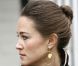 C'est sans maquillage, les cheveux attachés et des cernes sous les yeux que Pippa Middleton s'est rendue à son bureau à Londres, le 23 novembre 2011.